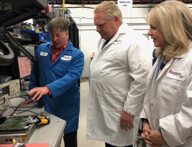 Renaissance CEO Len Anderson describing a card to Premier Doug Ford and MP Merrilee Fullerton.