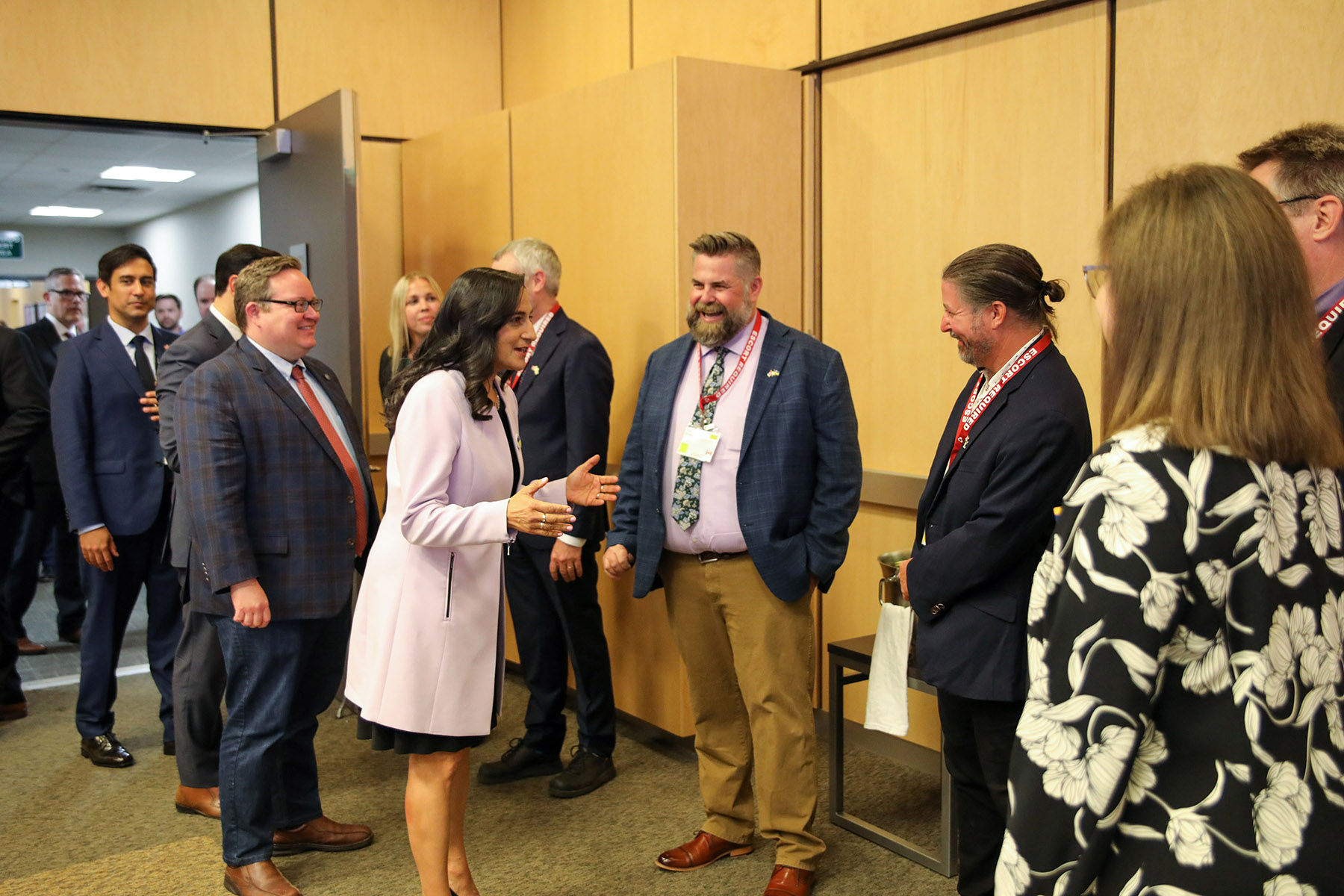 CEO Len Anderson in conversation with Minister of National Defense, Anita Anand, and another event participant.